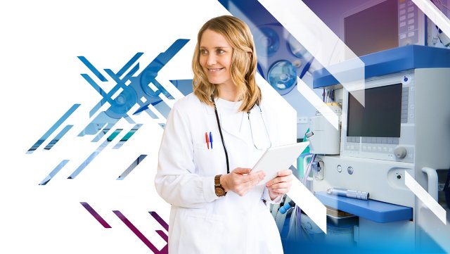 Woman in white coat with stethoscope and tablet in hospital